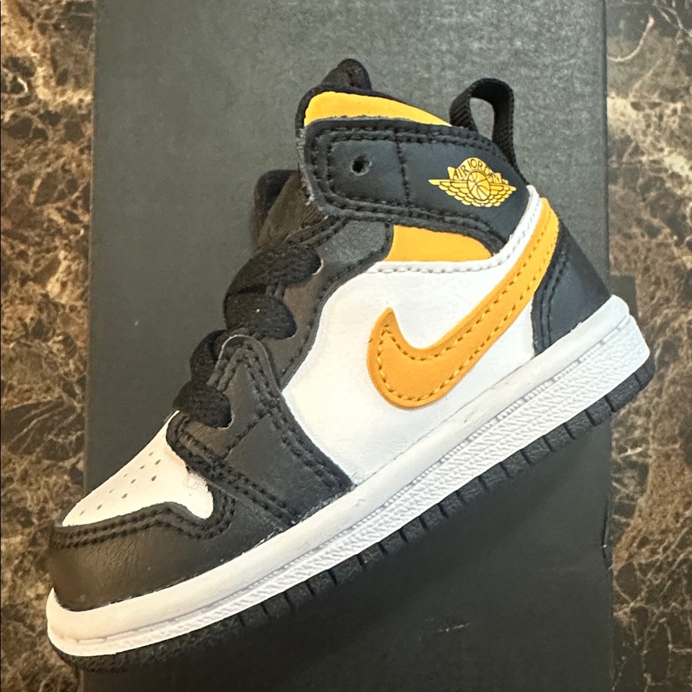 Jordan Black and White Mid 1 Sneakers